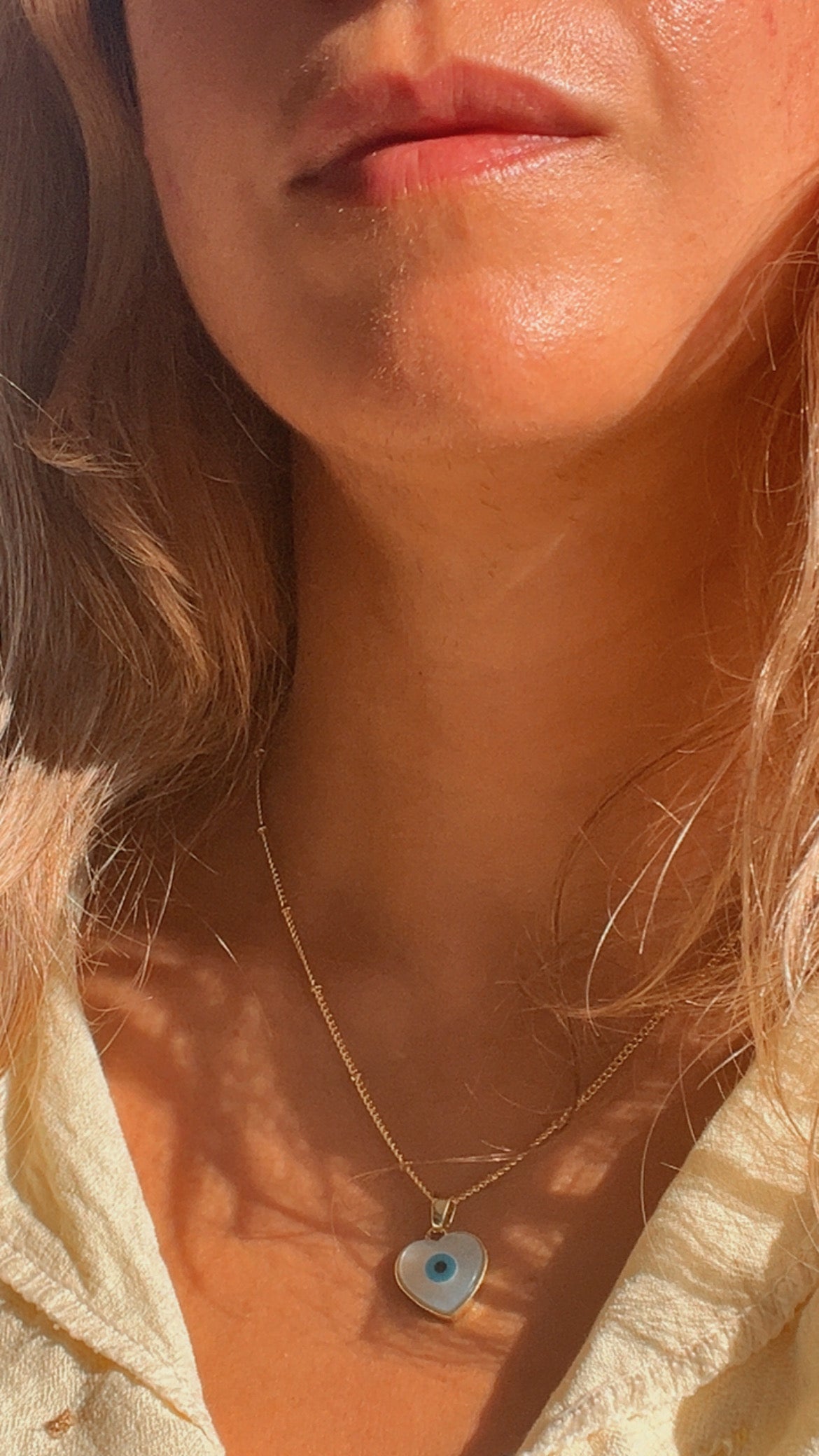 Collar corazón ojo turco